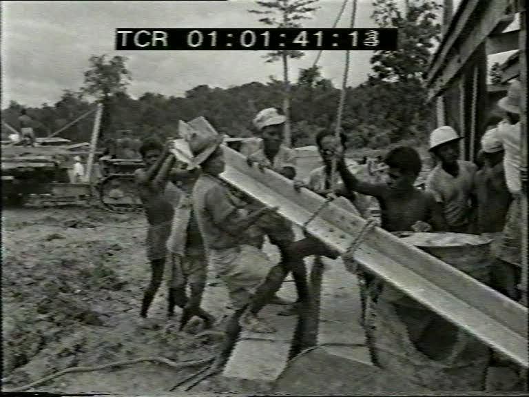 FI/1200/147 - 
Nieuw-Guinea Kroniek 1: Nieuw-Guinea in opbouw
