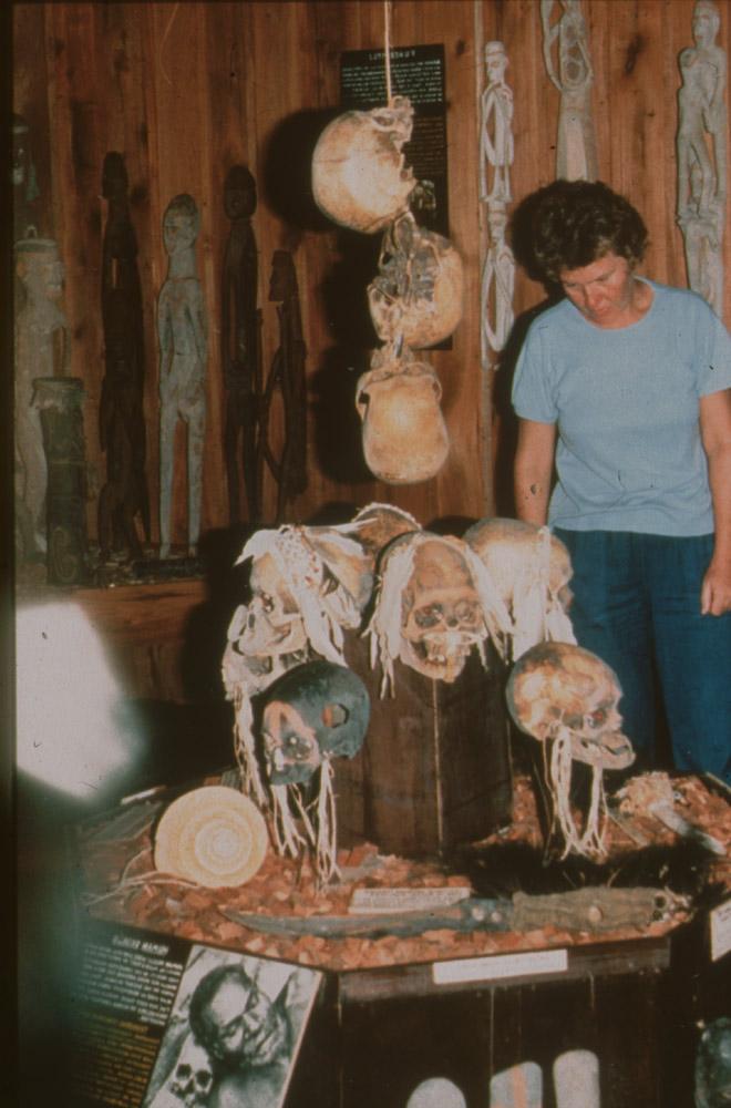 BD/30/62 -
Dutch woman looking at skulls at an exhibition