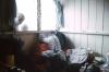 BD/166/168 Stapel kleding in hut
