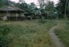 BD/288/76 Pad langs huizen Kampong Joka