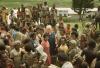 BD/132/54 groepsfoto van papua's met missionaris