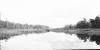 BD/133/277 Opname van de rivier met riet aan de oevers