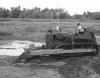 BD/133/476 Werken met een grondverplaatsingsmachine