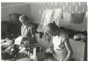BD/253/40 Twee katholieke zusters met kleding en stoffen