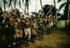 BD/66/198 Festiviteit, mannen met speren, geverfd en met o.m. hals- en hoofdversiering
