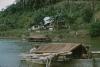 BD/171/563 Twee overdekte boten op rivier