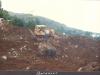 BD/269/629 Man poseert voor een buldozer