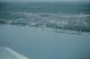BD/171/1147 Luchtfoto van dorp aan meer