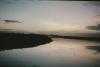 BD/171/1393 Rivier bij avond.