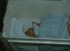 BD/171/874 Baby in bedje
